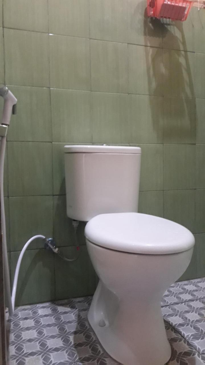 Penginapan Asidik Біра Екстер'єр фото